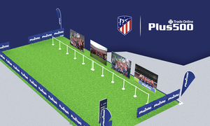 PLus500 stand del Día de las Peñas 