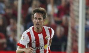 Temporada 2013/14. .Corona, centrocampista del Almería