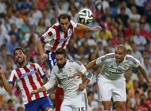 Temporada 14-15. Supercopa de España. Godín demostrando su poderío aéreo.