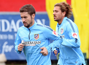 Temporada 14/15. Entrenamiento 10/10. Gabi y Cerci durante la sesión. Foto: Ángel Gutiérrez