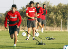 Temporada 13/14. Entrenamiento. Equipo entrenando en los Ángeles de San Rafael, Pizzi corriendo con pesas
