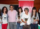Temporada 2013-2014. Las capitanas del Féminas posan con los trofeos