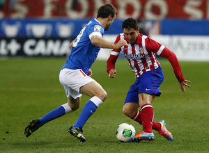 temporada 13/14. Partido Atlético de Madrid - Bilbao . Copa del Rey. Cristian Rodríguez con el balón